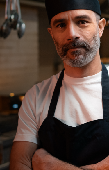 A chef in a busy kitchen.