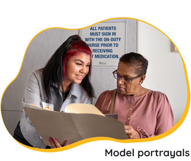 Two women discussing HIV treatment options.