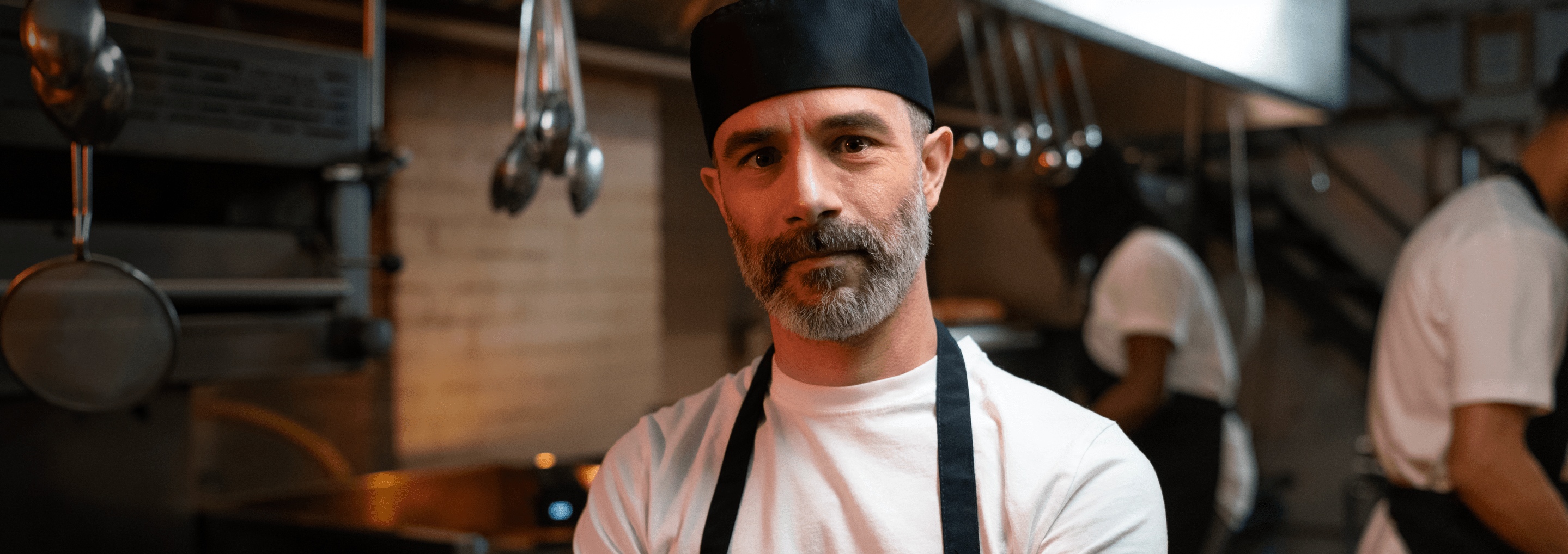 A chef in a busy kitchen.
